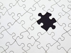 missing teeth represented by puzzle