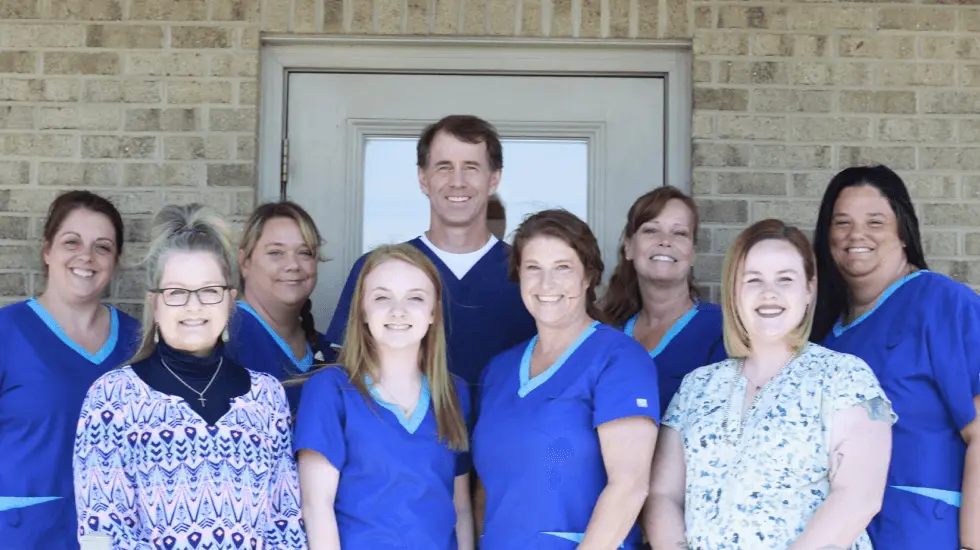 Chillicothe Ohio oral surgery team standing in front of Wilmington Oral Surgery office